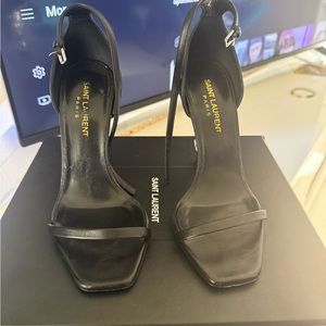 Saint Laurent
Opyum 110mm leather sandals